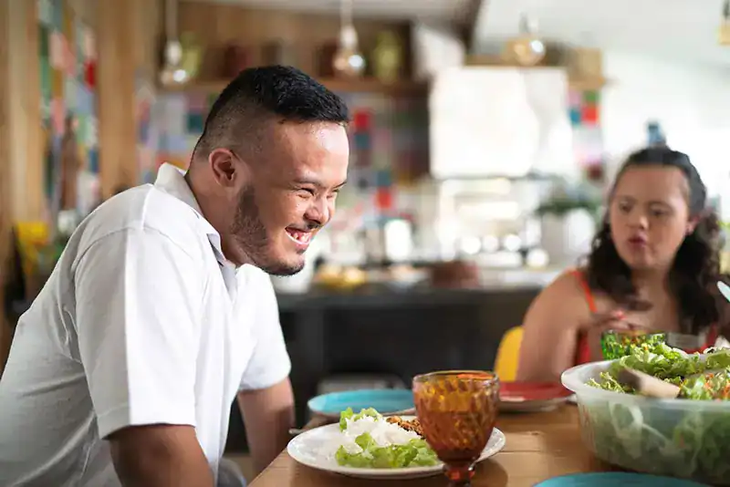 Empowering Weight Loss: A Comprehensive Guide for Individuals with Disabilities 2 Image of a disabled man and balance around nutrition to aid weight loss West Tilbury
