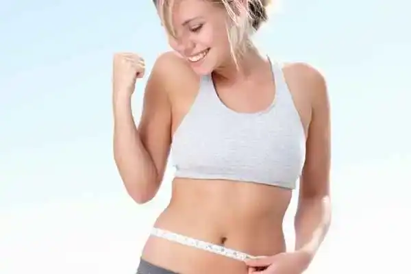 Unraveling the Mystery: Where Does the Body Fat Loss From First? 3 Image of woman happy with fat loss West Tilbury